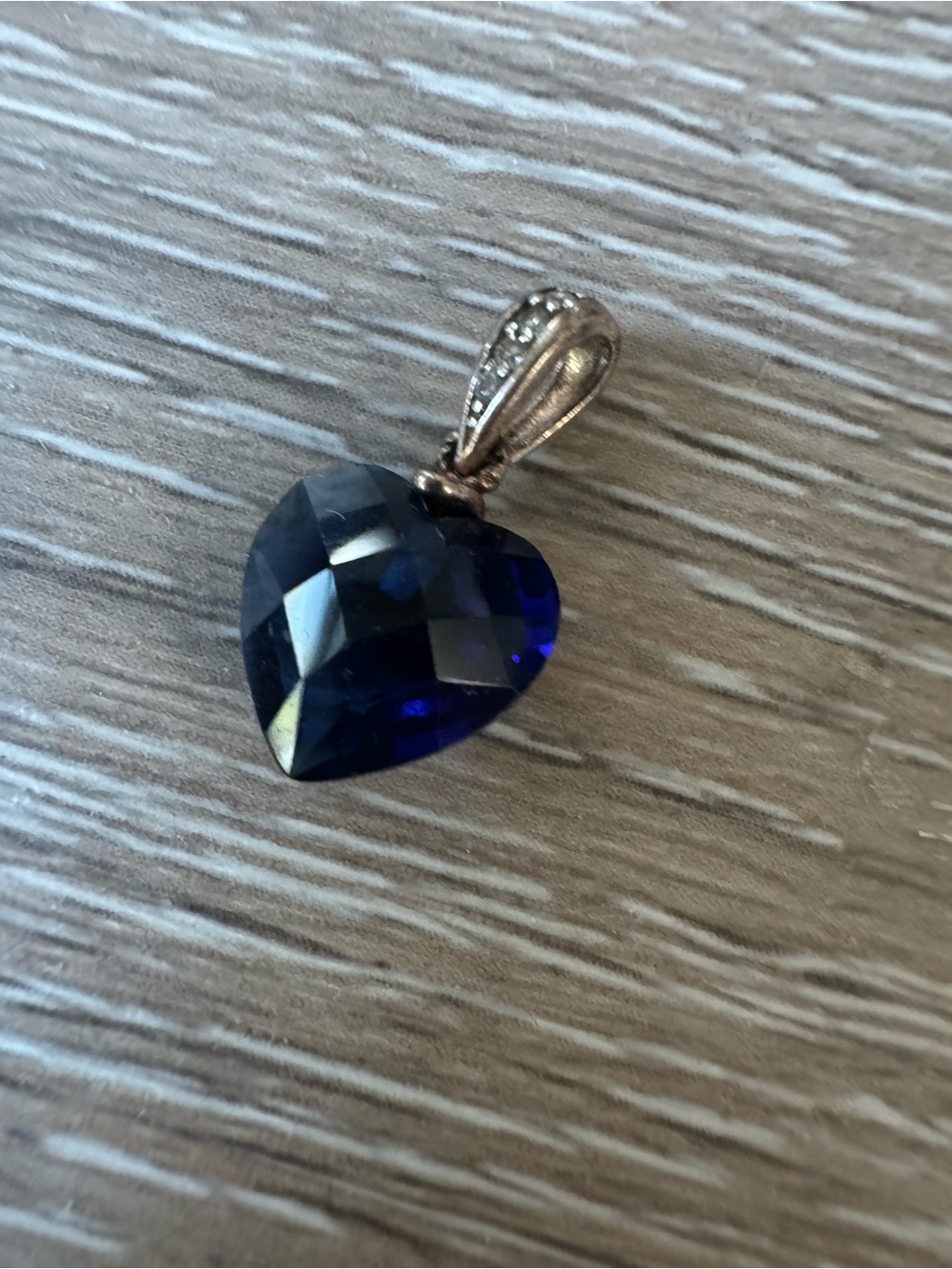 Heart shaped blue CZ pendant on 925 silver bail